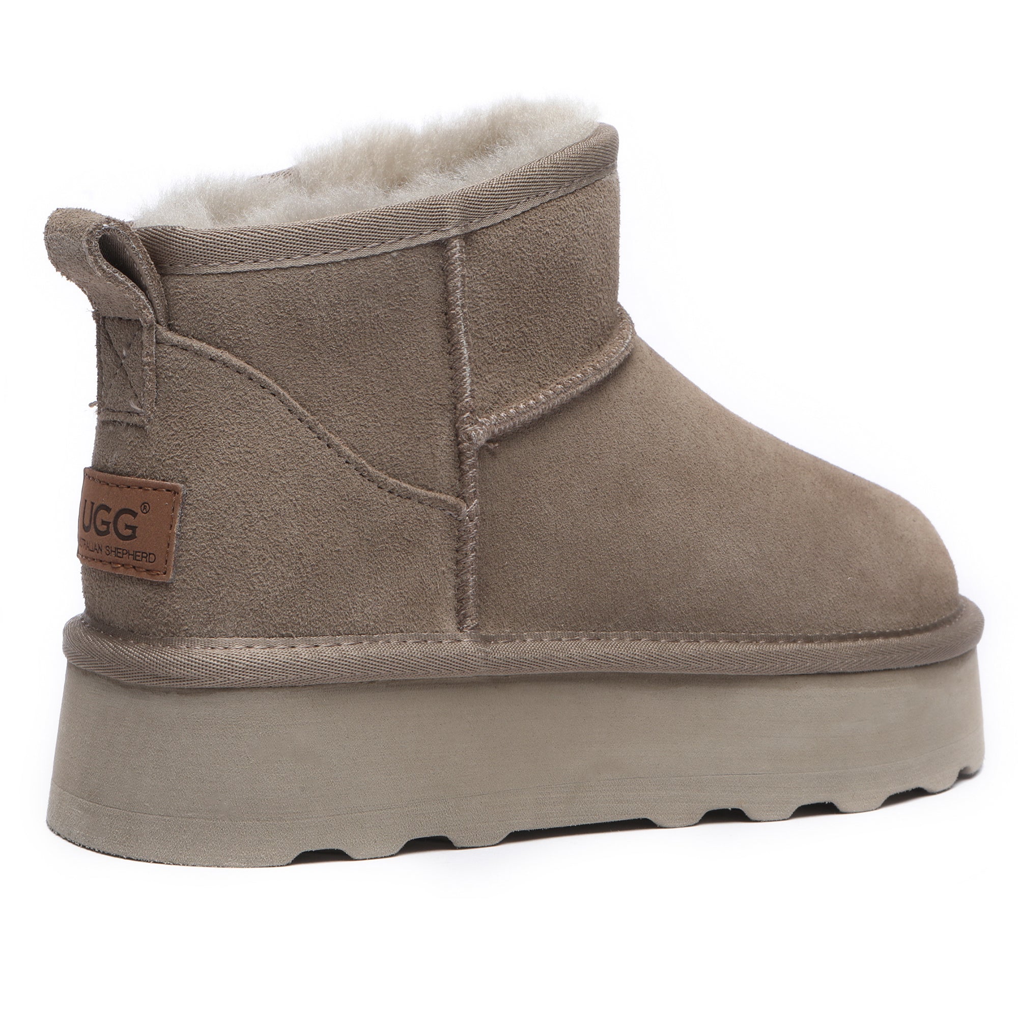 EverUgg Premium Platform Mini UGG Boots in taupe, showing a close-up of the cozy suede exterior and plush interior.