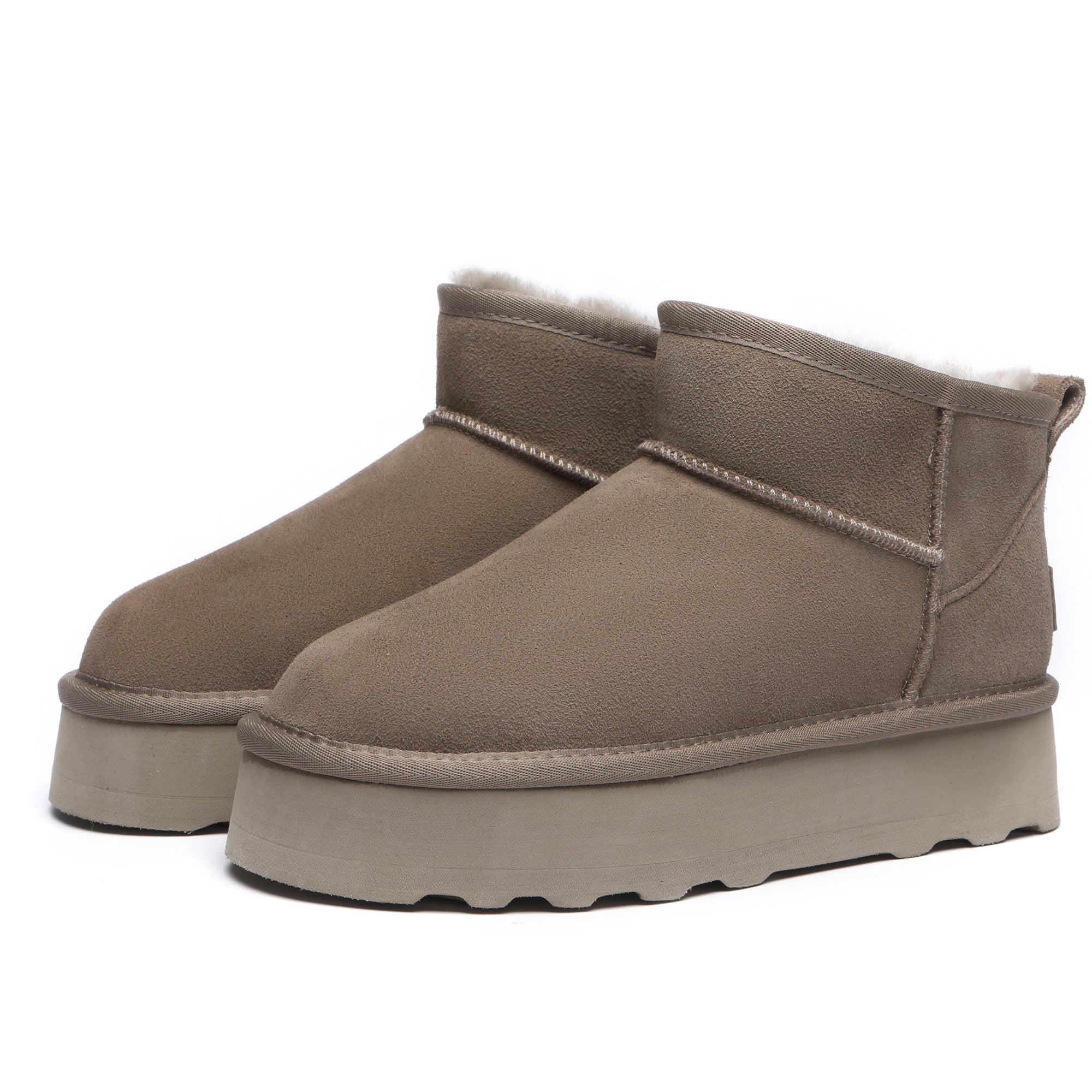 EverUgg Premium Platform Mini UGG Boots in neutral color, showing the stylish ankle-high design and textured sole.