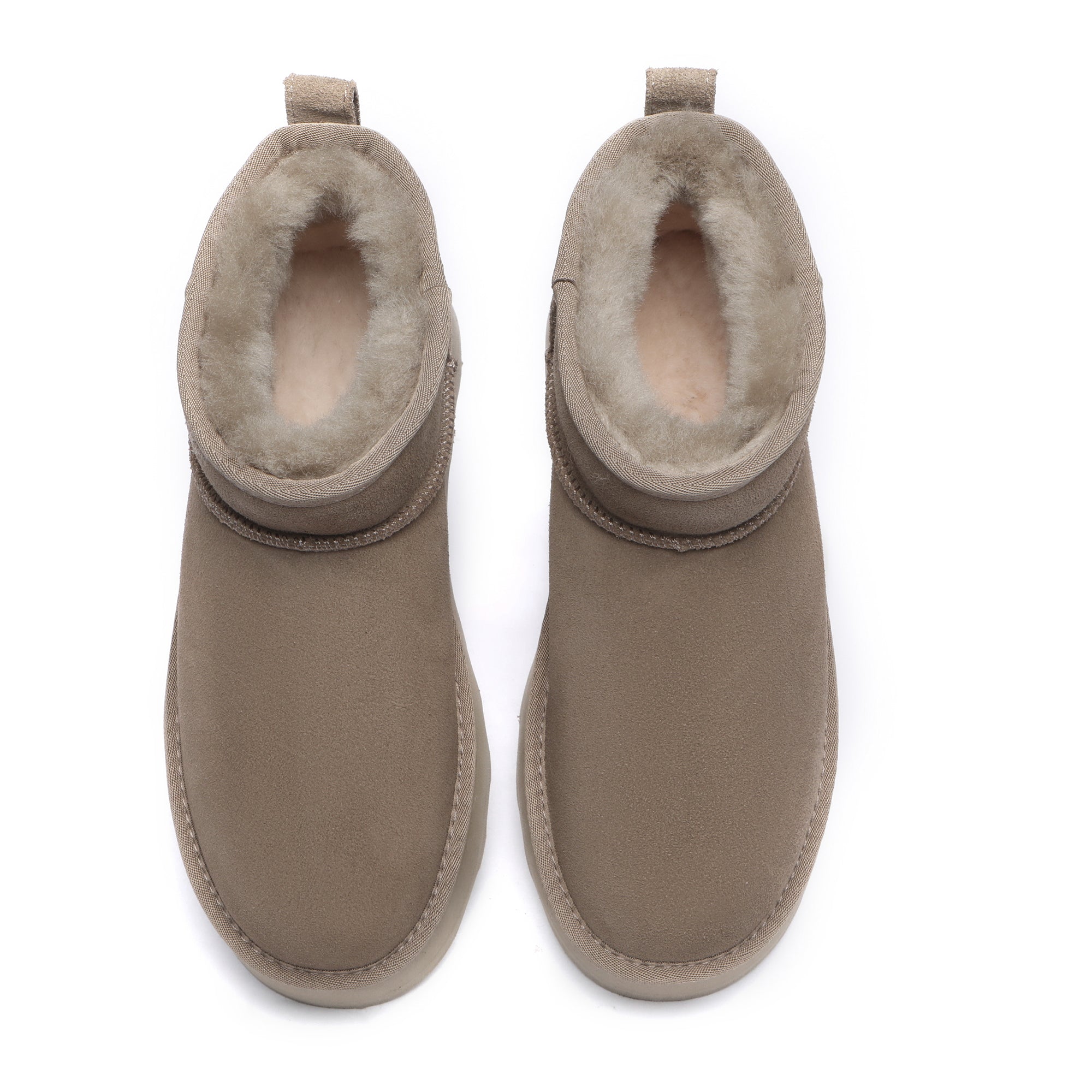 Close-up of EverUgg Premium Platform Mini UGG Boots showing soft suede material and cozy shearling lining.