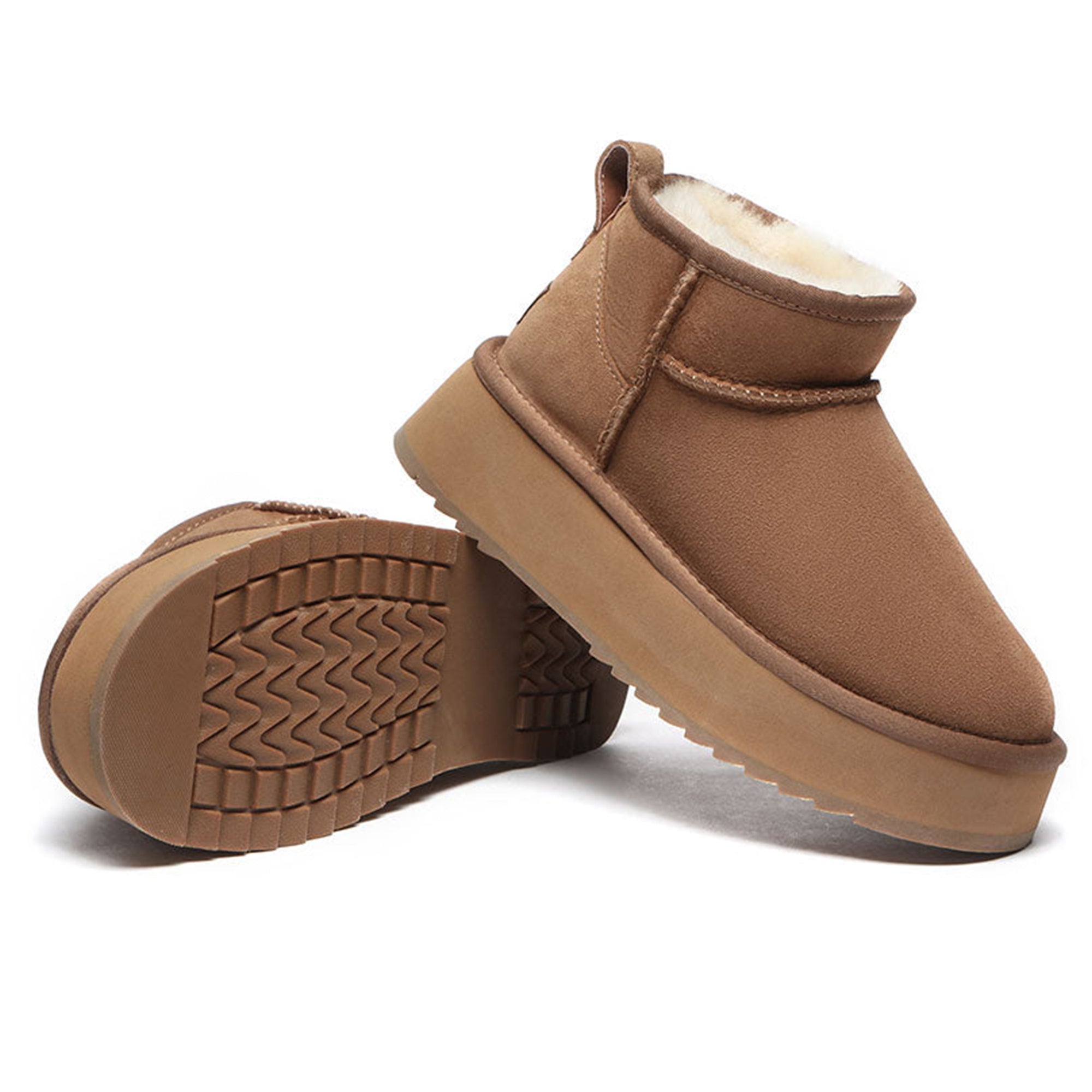 Close-up of EverUgg Premium Ultra Mini Platform UGG Boots showcasing the beige suede material and chunky platform sole.