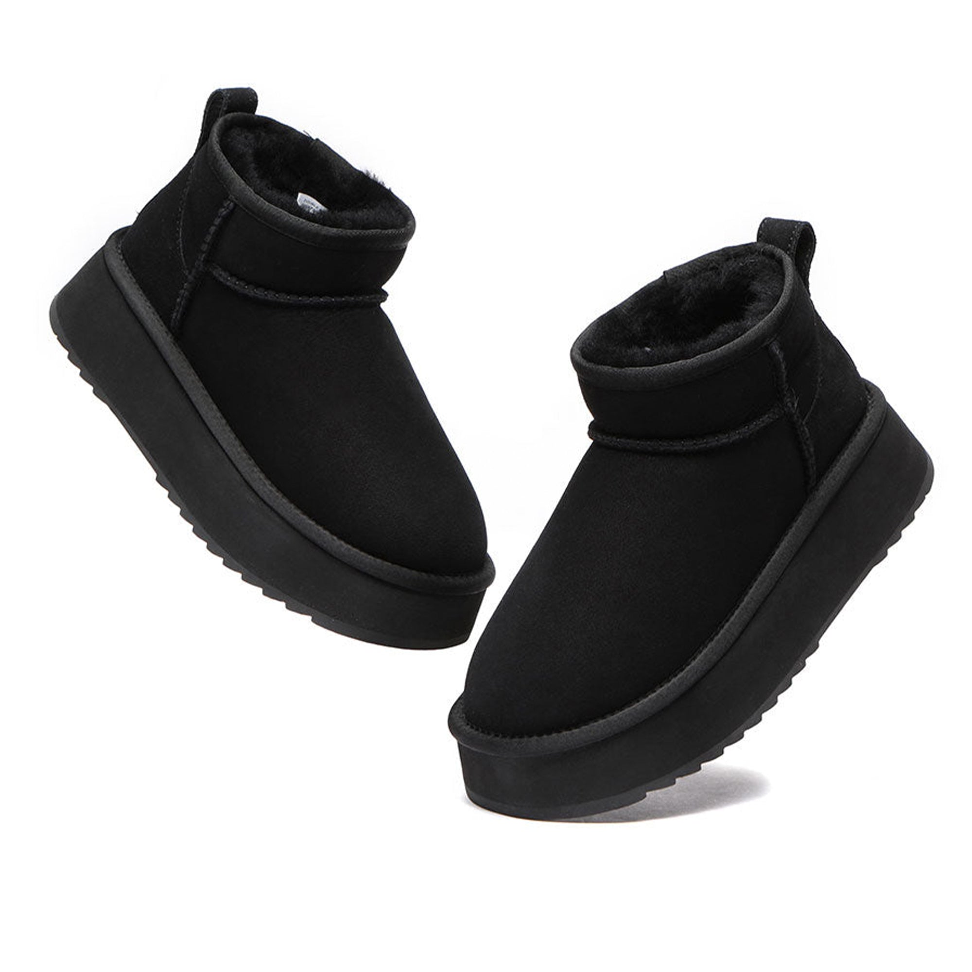 Close-up of EverUgg Premium Ultra Mini Platform UGG Boots showing the tan leather exterior and rugged sole design.