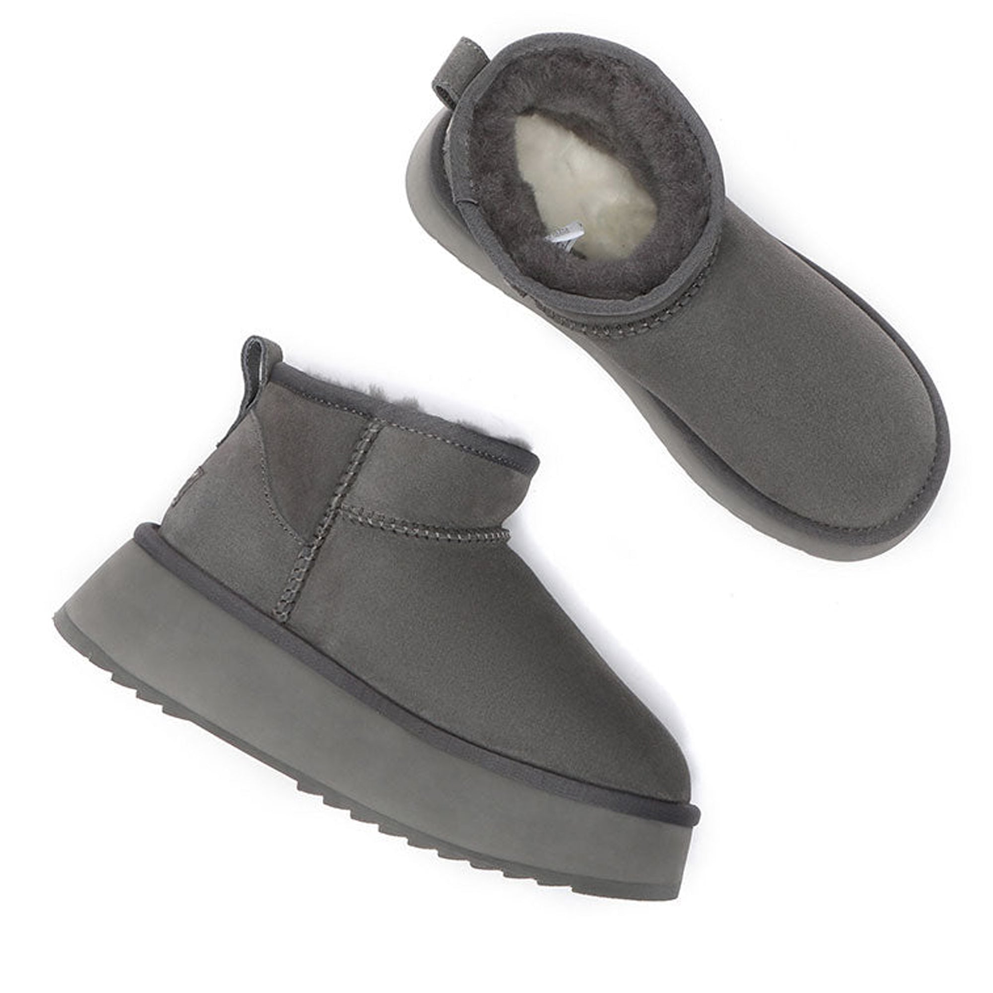 EverUgg Premium Ultra Mini Platform UGG Boots in soft suede with chunky soles and cozy lining, shown from a side view.