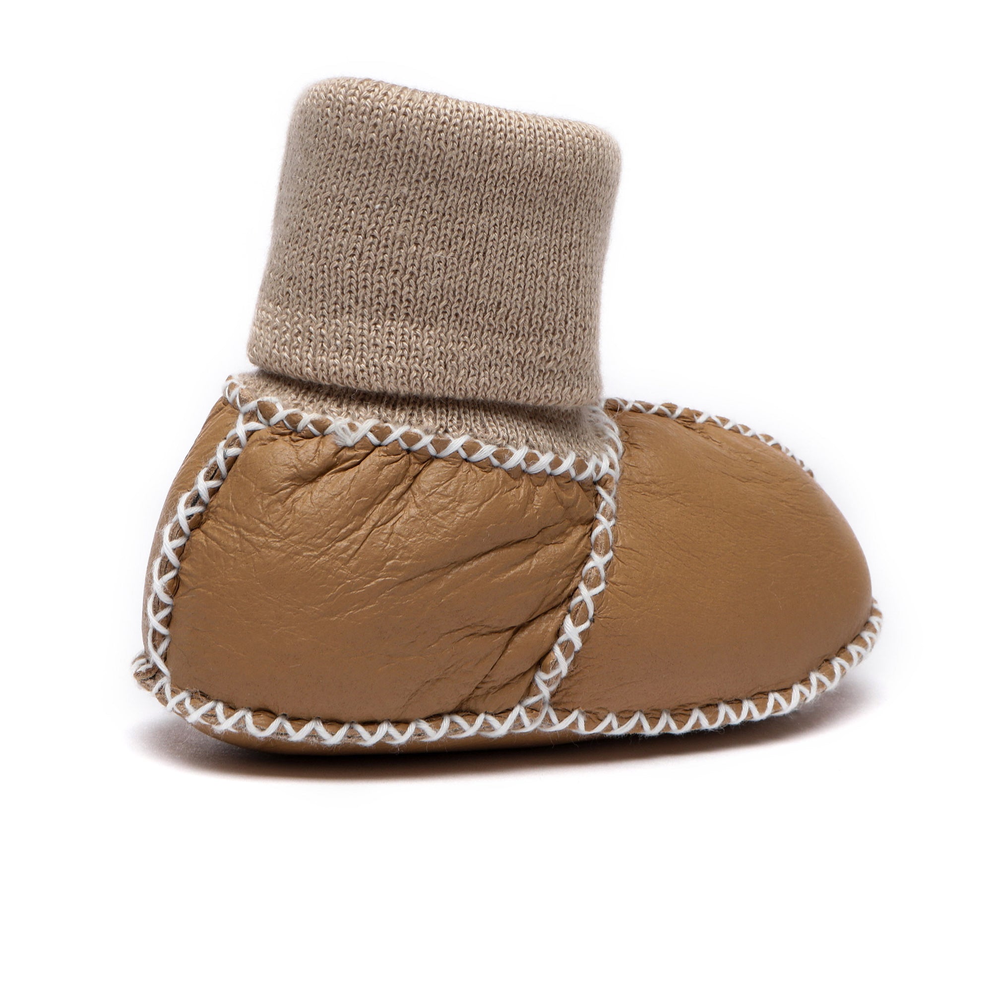 Cute EverUgg baby booties made of soft material, featuring a cozy design for infants, in a neutral color.