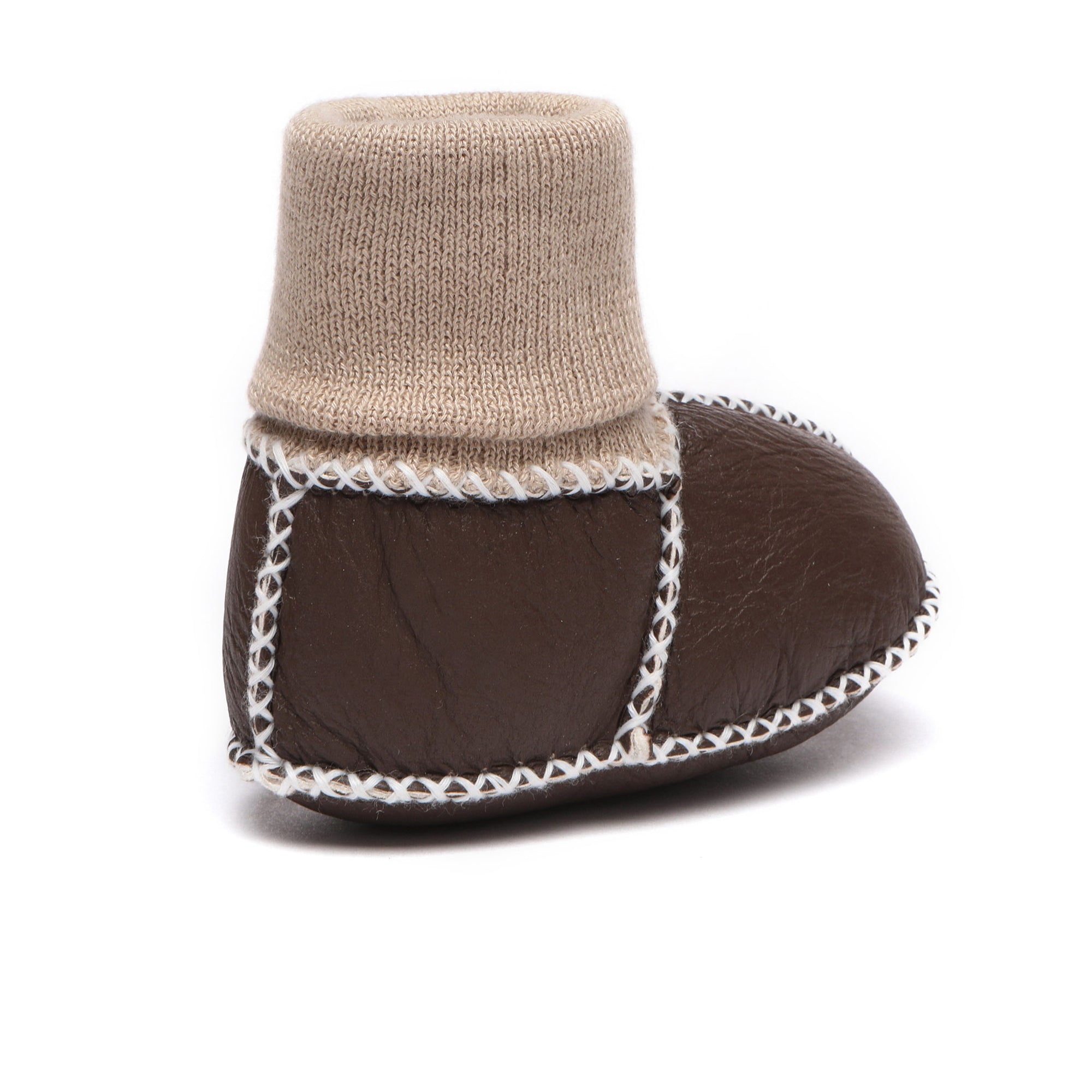Soft EverUgg baby booties in tan with plush lining, designed for comfort and warmth for infants.