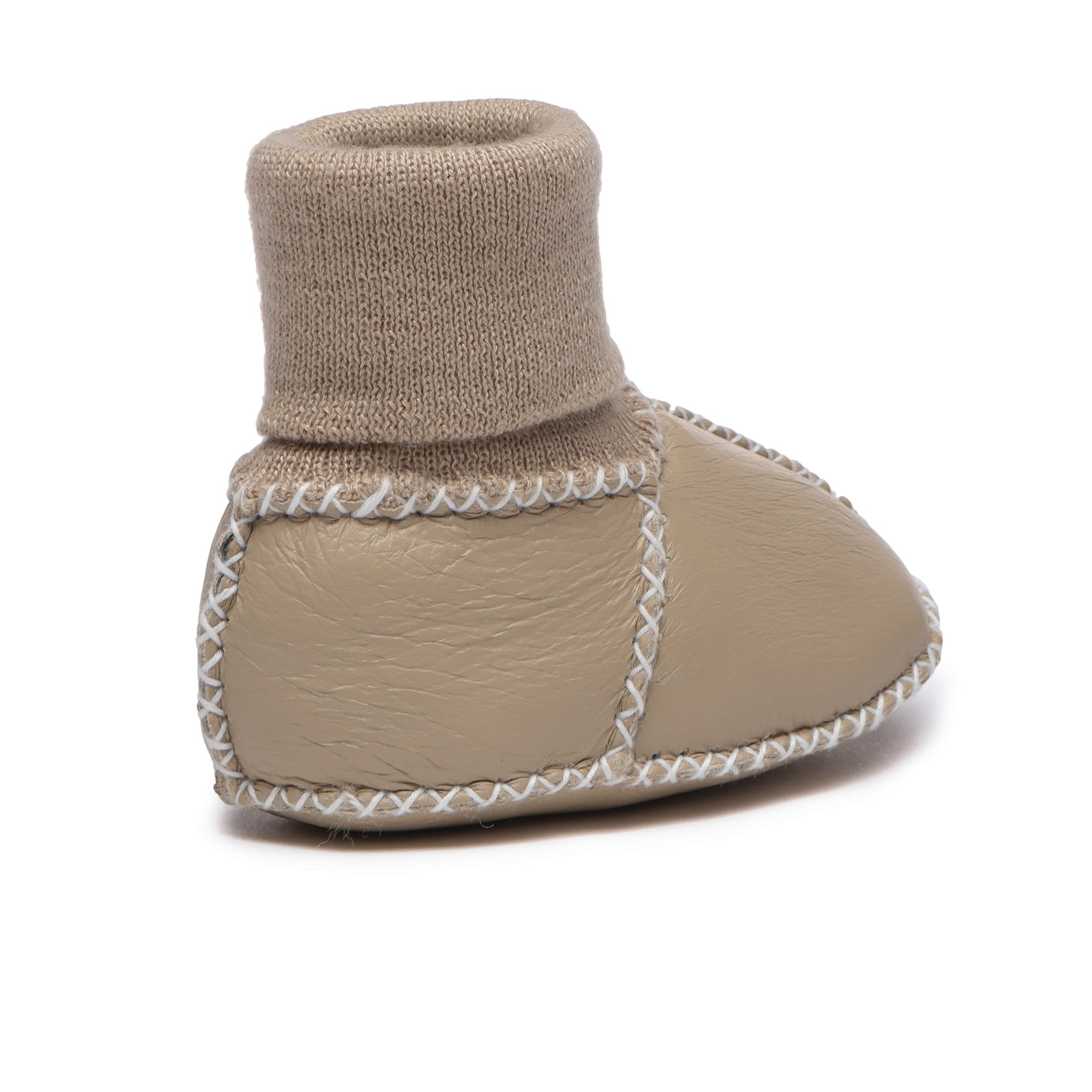 Baby UGG boots by EverUgg, soft and cozy children's shoes with plush lining and suede exterior, designed for warmth and comfort.