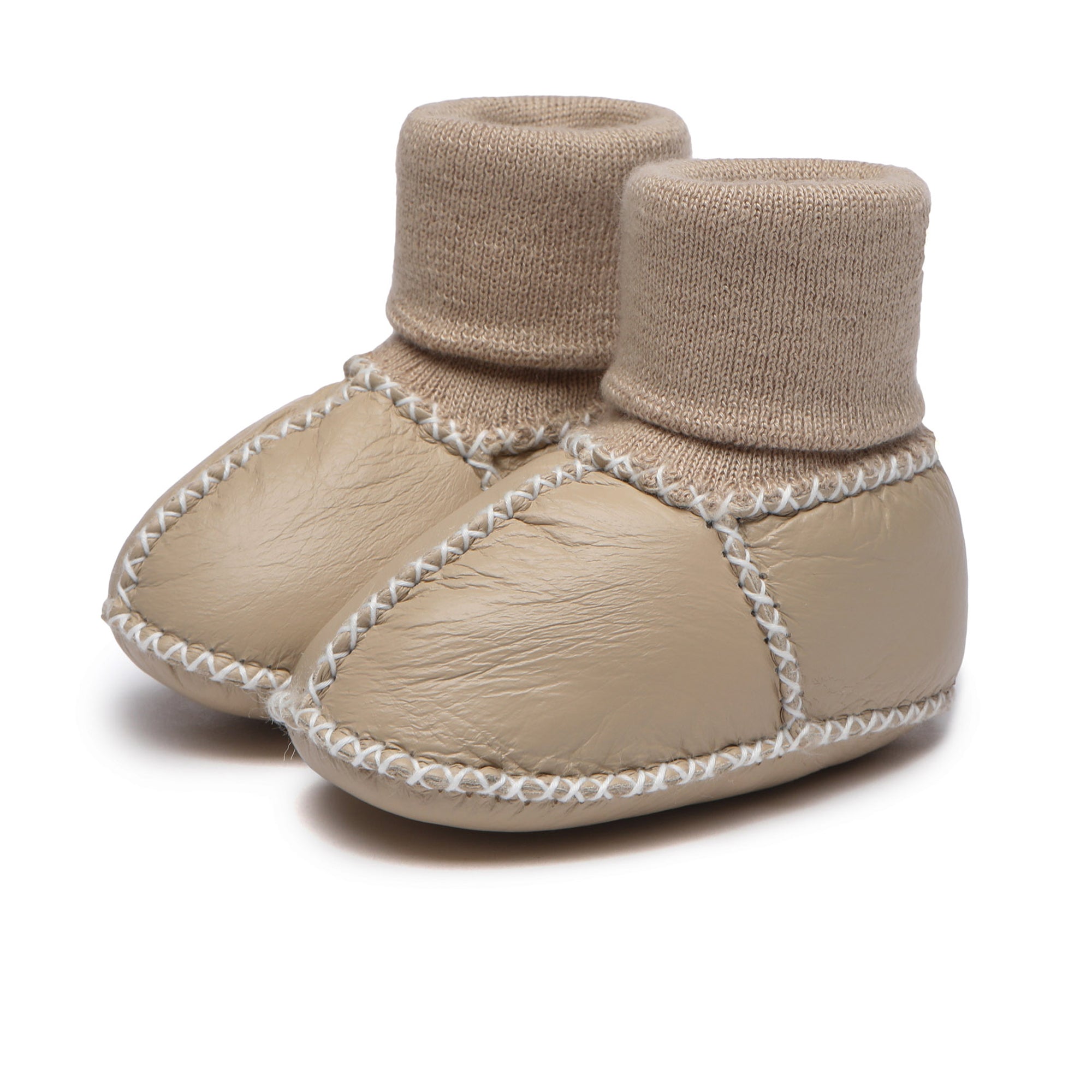 EverUgg baby booties in soft, cozy UGG style with plush interior and tan leather look, perfect for infants' comfort and warmth.