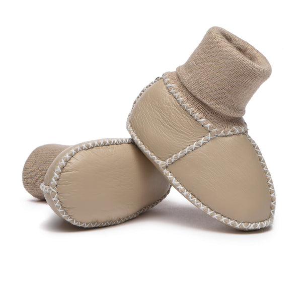 EverUgg baby booties in soft, cozy UGG style shoes for infants, featuring plush material and adorable design.