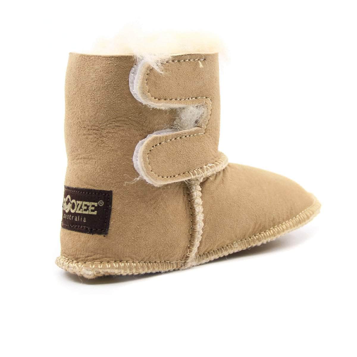 Baby UGG boots by UGG Direct NY in soft, plush material, designed for infants and toddlers, featuring a cozy and stylish look.