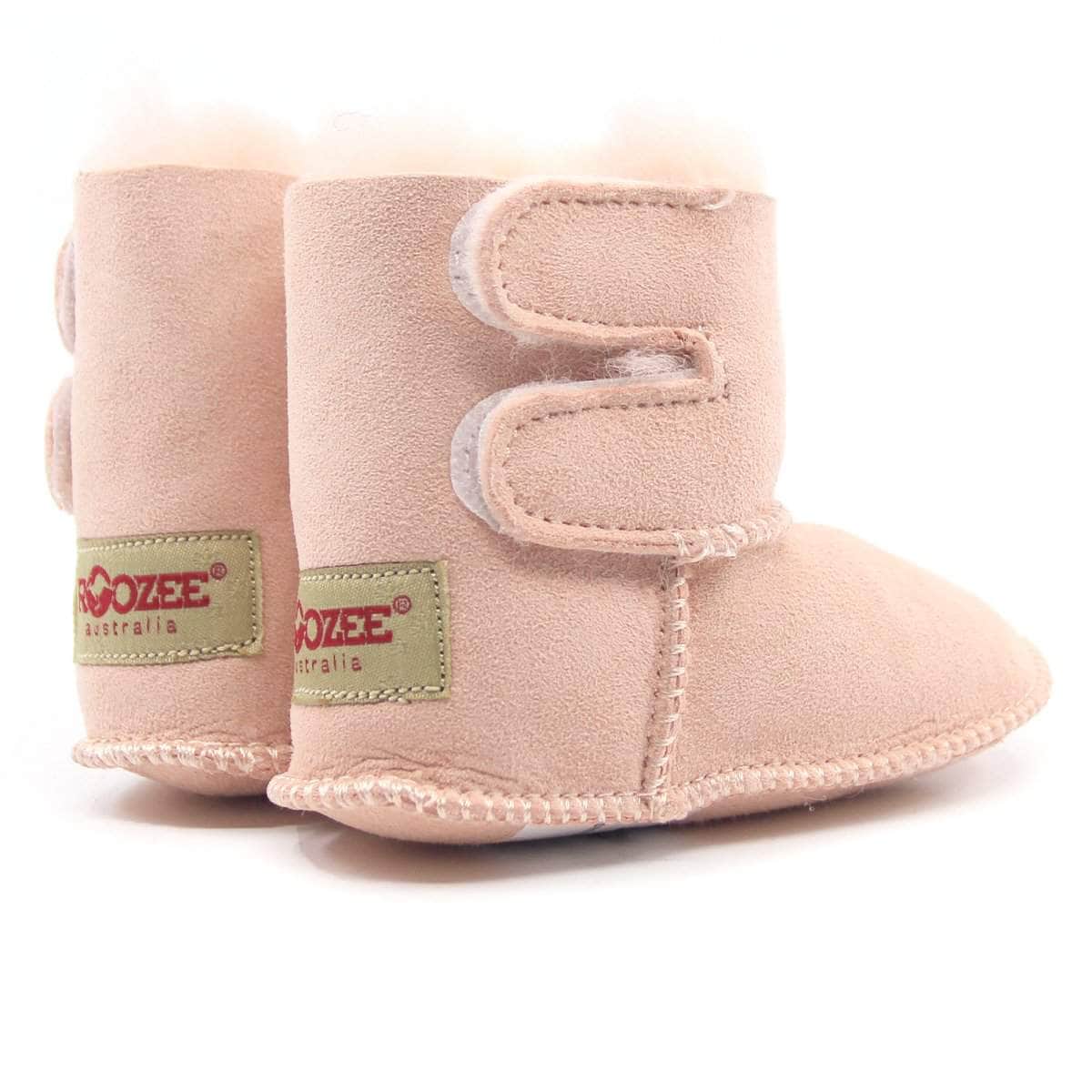 Cute UGG Baby Boots in soft pink with plush lining, cozy footwear for infants from UGG Direct NY.