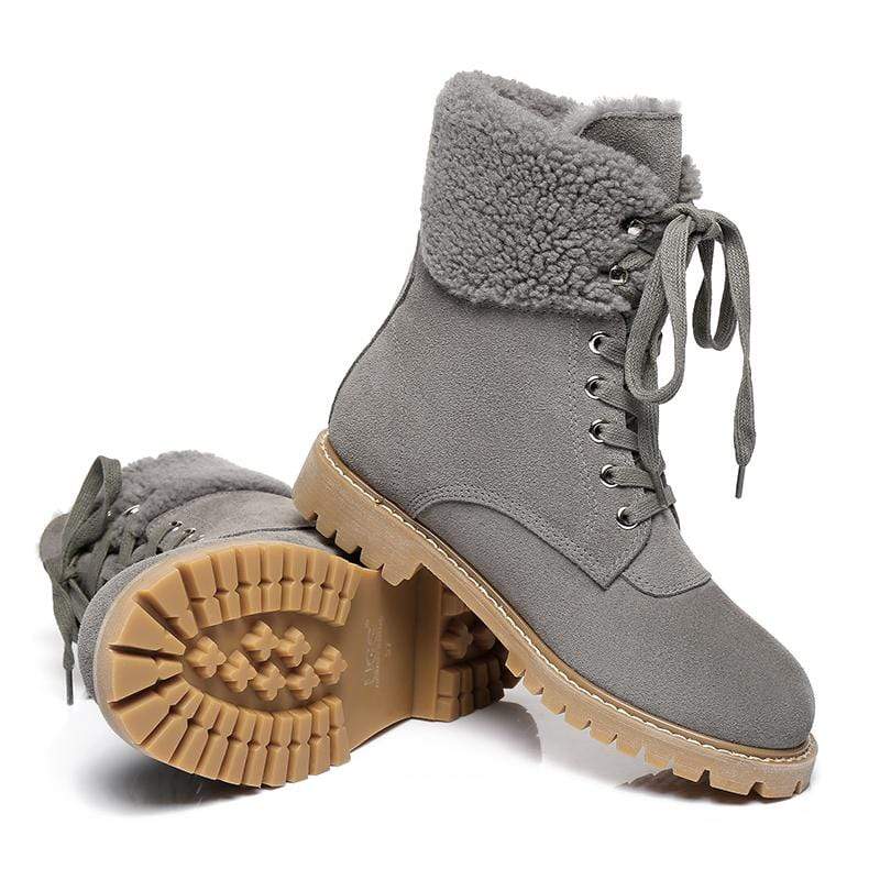 EverUgg UGG Irene fashion boots for women, showcasing stylish leather boots with buckle details and a chic silhouette.