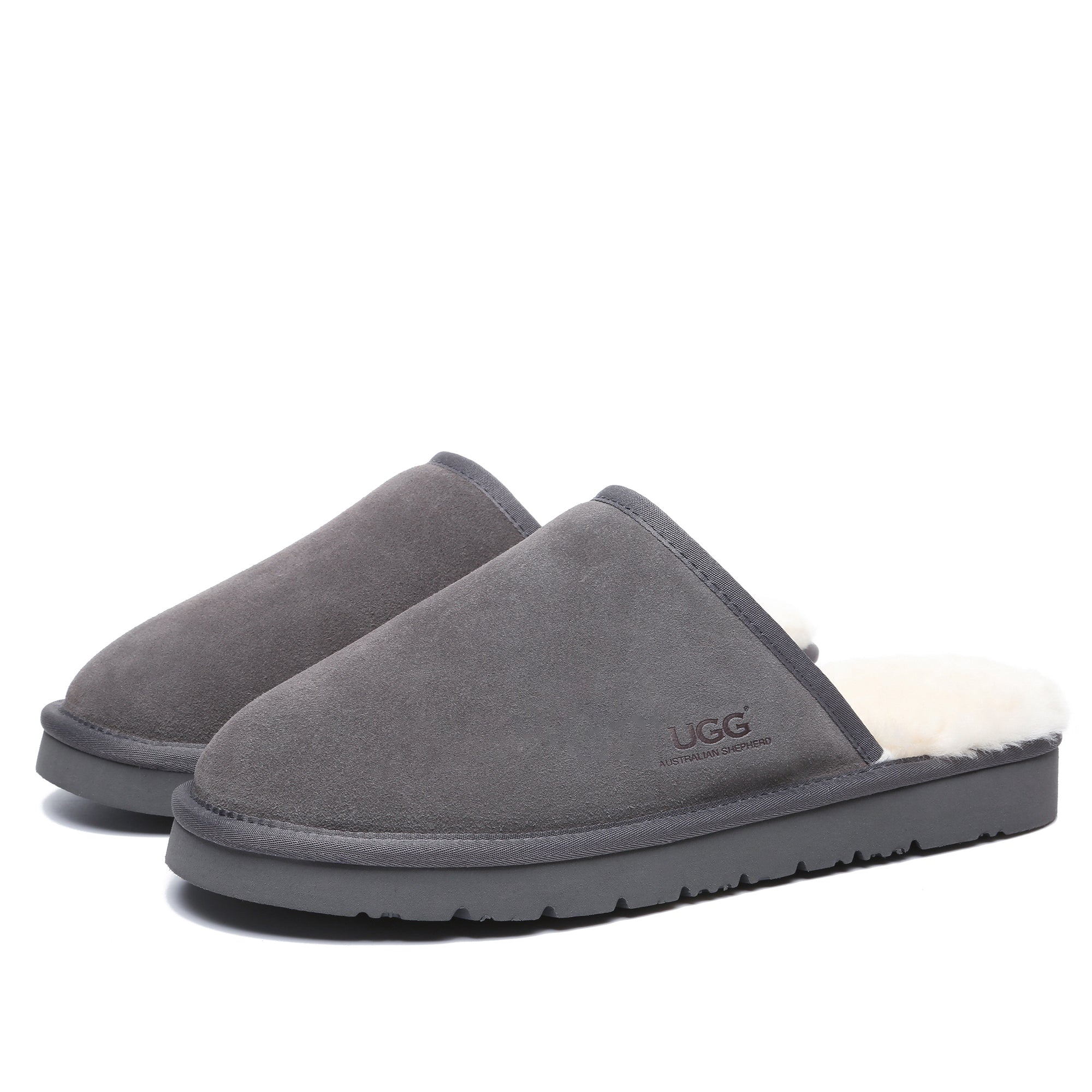 Grey UGG men's slippers with ultra comfort soles, featuring soft plush lining and slip-on design for cozy indoor wear.
