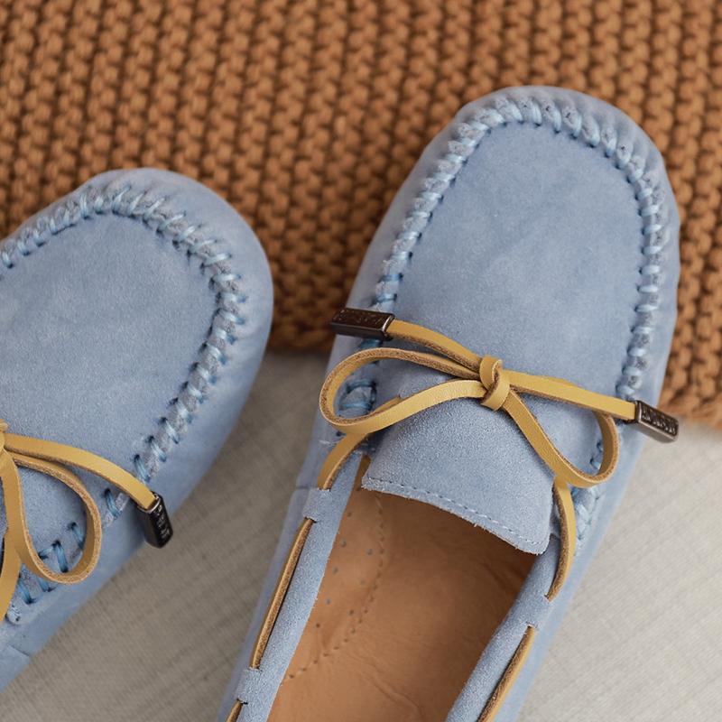 AuSnow UGG Ozsnow moccasin slippers for women, cozy slip-on shoes with plush lining and soft suede exterior.