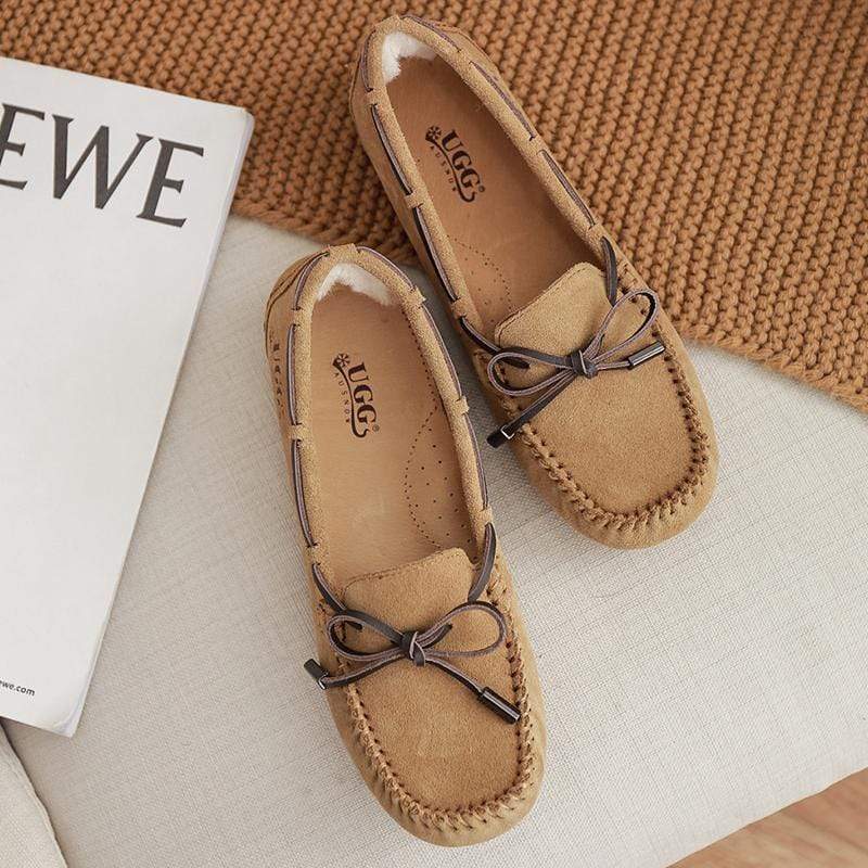 AuSnow UGG Ozsnow Moccasin Slippers for women, cozy slip-on shoes with plush lining and suede exterior.