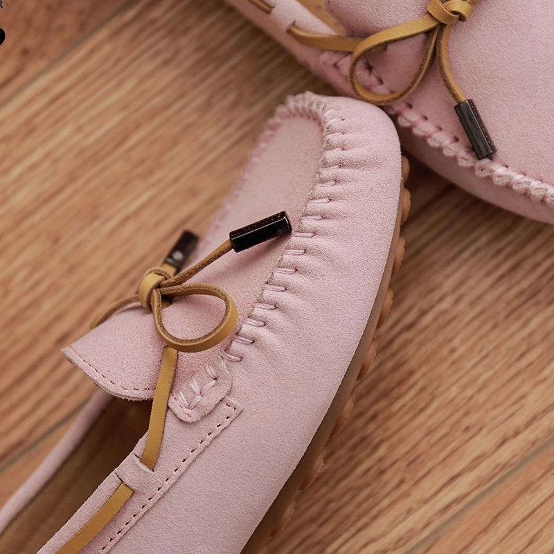 AuSnow UGG Ozsnow Moccasin Slippers for women, cozy slip-on shoes with plush lining and classic moccasin design.