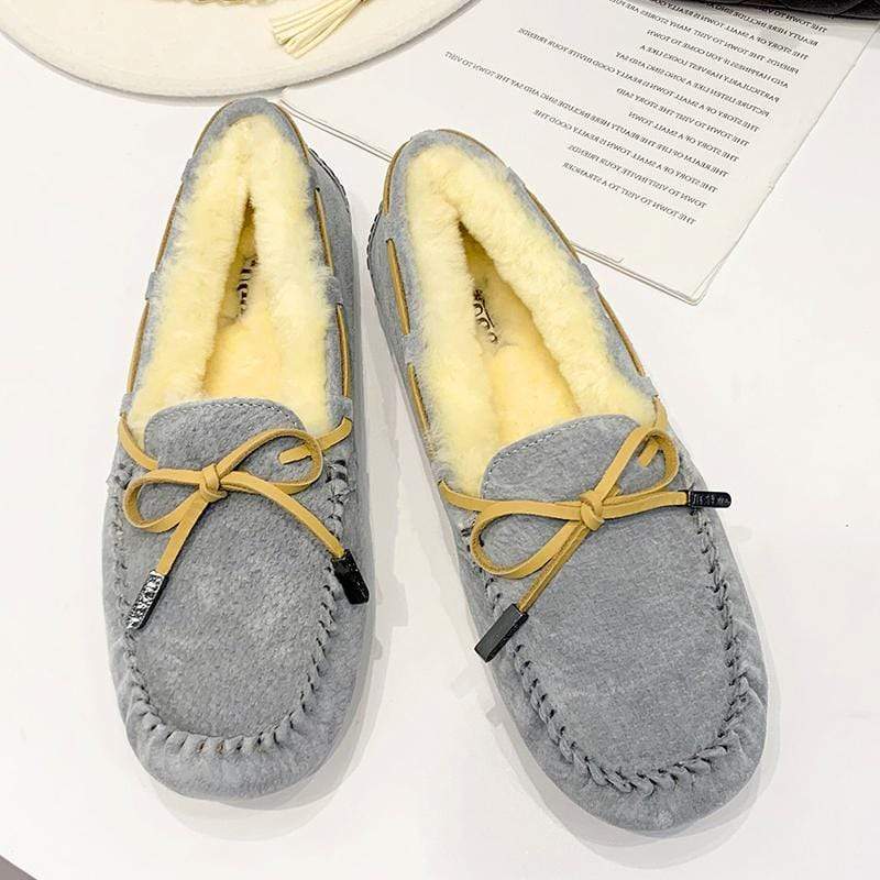 AuSnow UGG Ozsnow Premium Moccasin women's slippers with soft suede exterior and plush lining for cozy comfort.