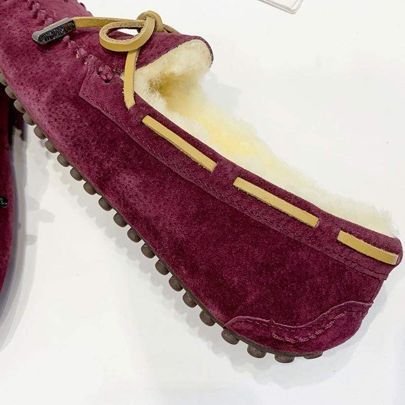 AuSnow UGG Ozsnow Premium Moccasin slippers for women, featuring soft leather and cozy lining in a stylish moccasin design.