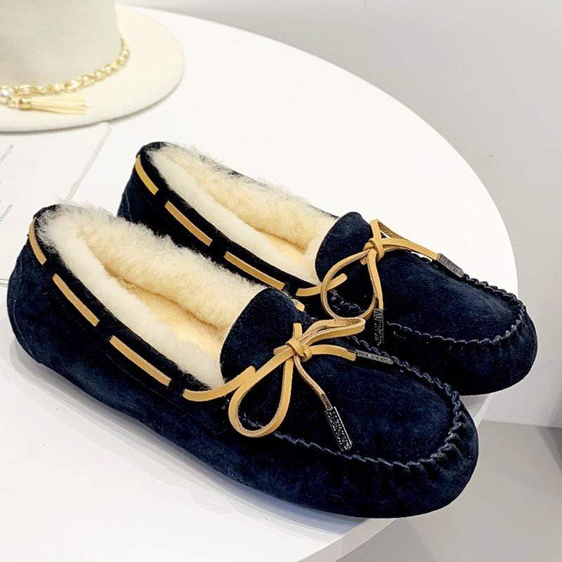 AuSnow UGG Ozsnow Premium Moccasin in soft leather, featuring a cozy slip-on design with plush lining for women’s slippers.