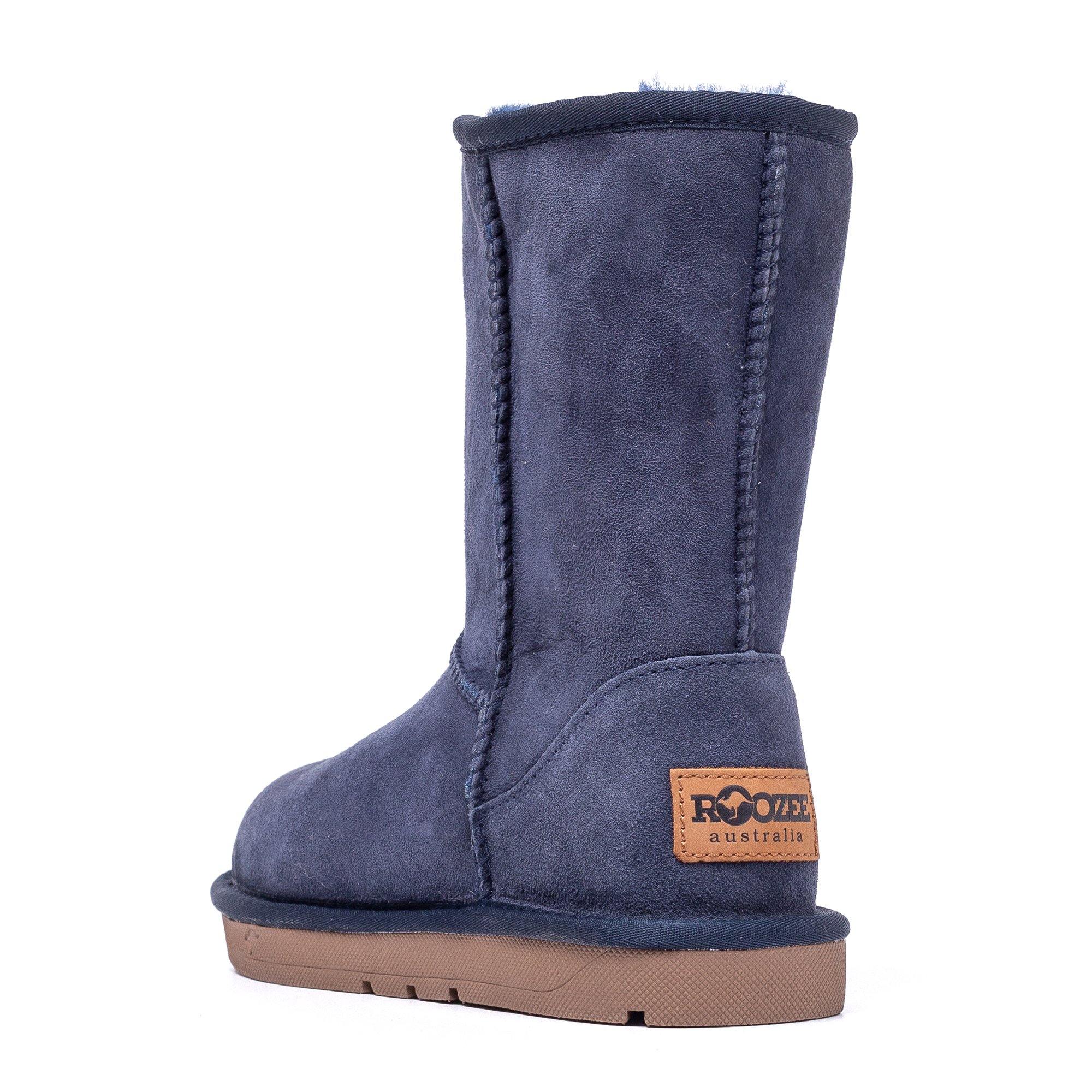 Navy UGG Roozee Short Classic Boots for women with plush sheepskin lining and suede exterior, stylish and cozy footwear.