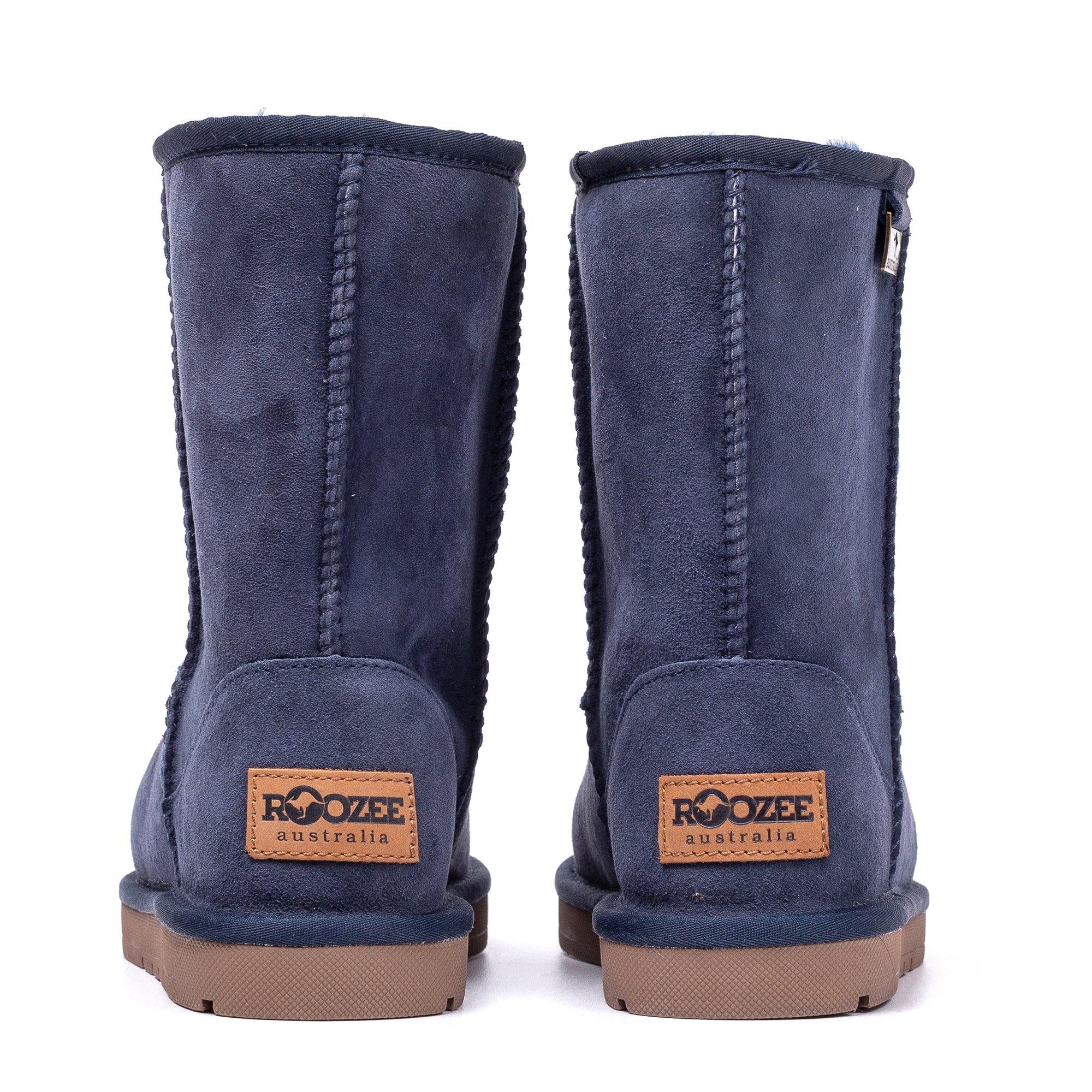 Navy UGG Roozee Short Classic Boots for women, featuring soft suede exterior and sheepskin lining, displayed on a plain background.