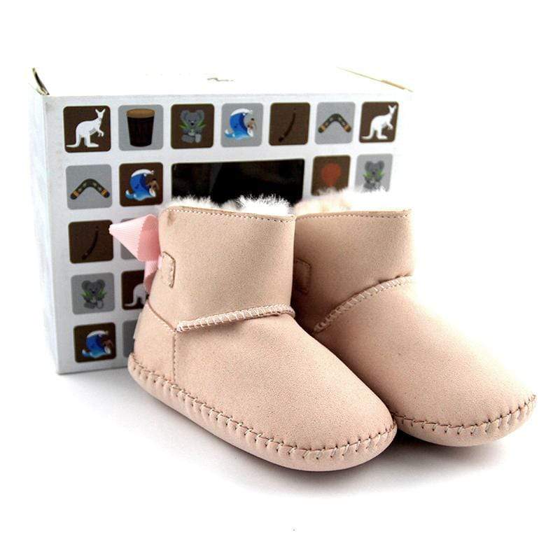 DK UGG stylish baby boots for kids in soft, cozy material with cute design, perfect for keeping little feet warm and fashionable.
