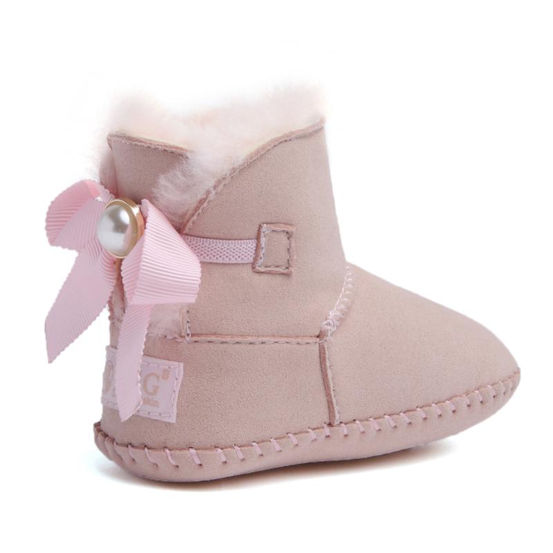 DK UGG stylish baby boots for kids, soft fabric shoes with cozy lining and fashionable design, perfect for little feet.