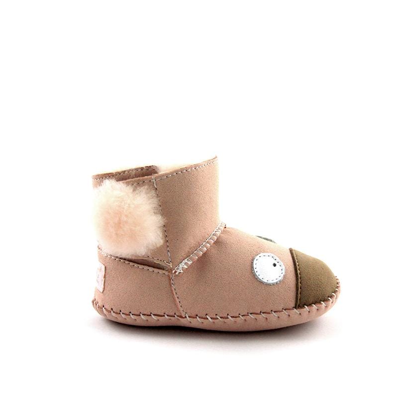 Pink DK UGG stylish baby boots with koala design for kids, featuring soft, cozy shoes suitable for little ones.