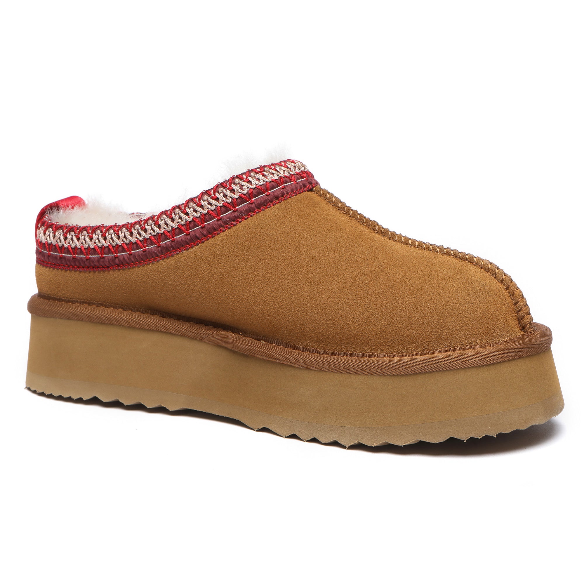 EverUgg Vinny UGG platform slippers with plush lining and chunky sole, shown in a cozy indoor setting.